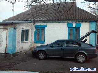 Дом кирпичный в пгт Гребенки, участок 29 соток