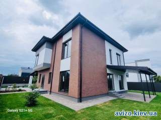 Продам 2 єт.кирпичній дом 200 кв.м. в с.Лесники,ул.Захрестова