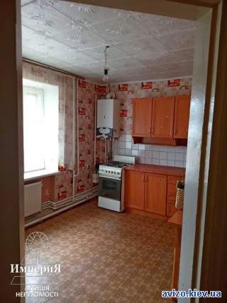 Продам 2-Х з автономкою.56 метрів.Цегляний будинок.